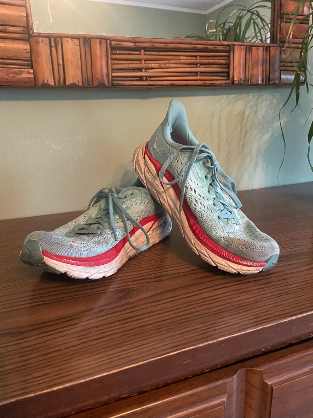 HOKA Turquoise and Coral Clifton 8 Runners
